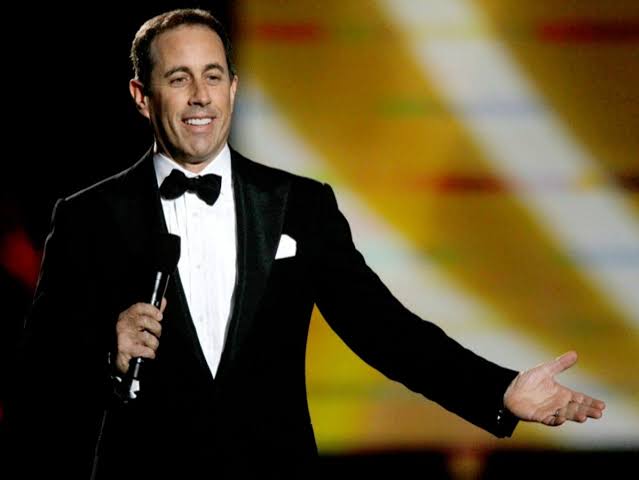 Jerry Seinfeld performing on tour